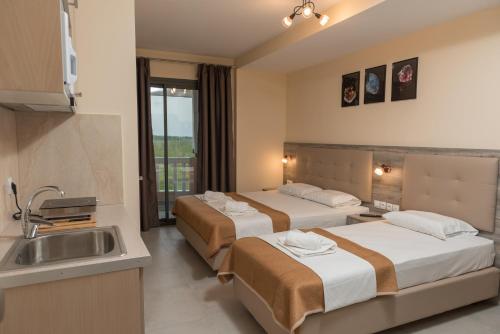 Cama o camas de una habitación en INO Luxury Rooms