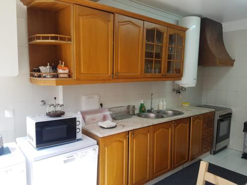 Kuchyň nebo kuchyňský kout v ubytování Cascais Spacious Getaway