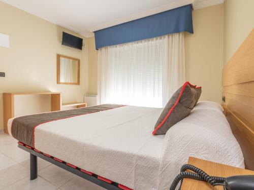 Кровать или кровати в номере Hotel Casa Marín