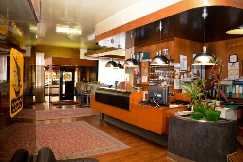 Kuchyň nebo kuchyňský kout v ubytování Hotel Salieri