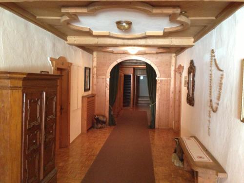 a hallway in a house with a ceiling at Gasthaus Sonne in Tarrenz