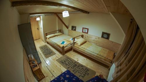 an overhead view of a room with a bed in a room at Golema Reka in Crni Vrh