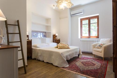 Ένα ή περισσότερα κρεβάτια σε δωμάτιο στο Villa Ammaliante