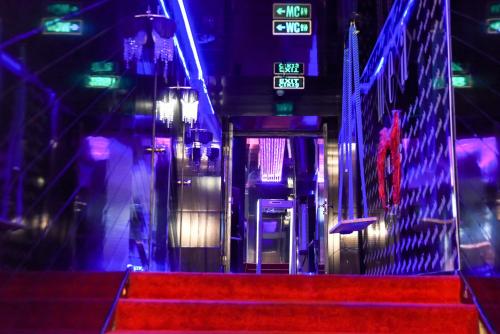 a set of stairs with blue and purple lights at Topkapi Inter Istanbul Hotel in Istanbul