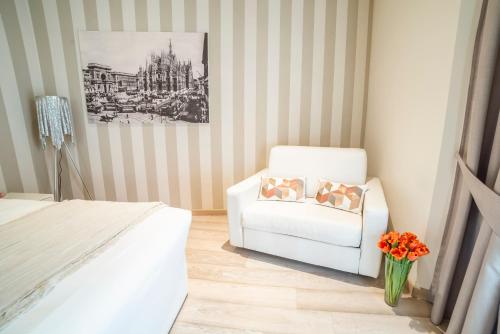 Un ou plusieurs lits dans un hébergement de l'établissement Rooms Milano Duomo