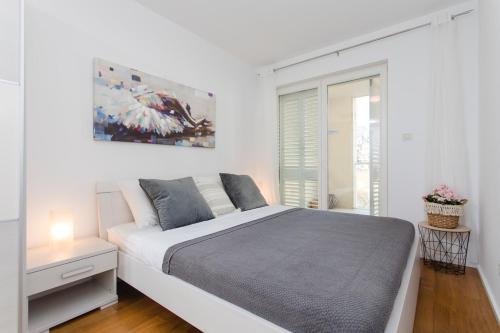 Posteľ alebo postele v izbe v ubytovaní Luxury Apartment at the Beach