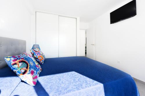 Postel nebo postele na pokoji v ubytování EDIFICIO SUR