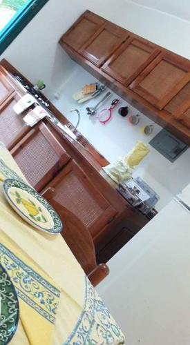 a room with a table with a plate on it at villa Clara in Los Róbalos