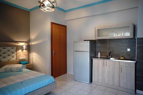 Posteľ alebo postele v izbe v ubytovaní Blue Dream Hotel
