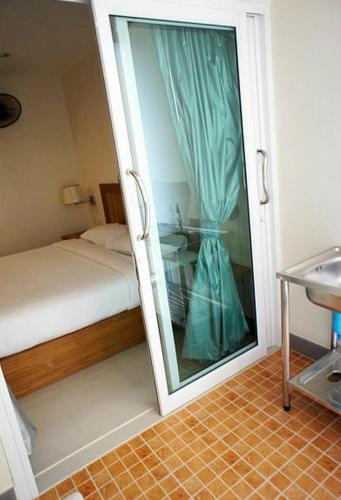 Кровать или кровати в номере D Apartment