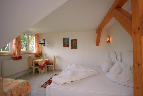 Un pat sau paturi într-o cameră la Seeberg