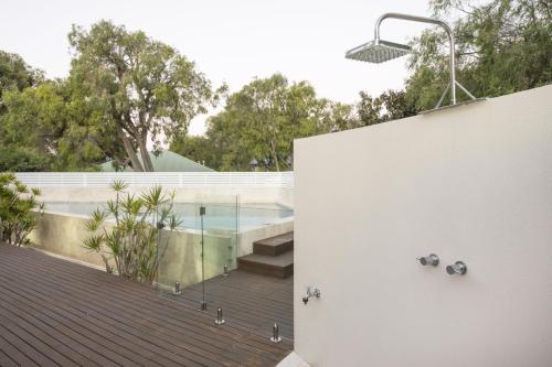 a house with a swimming pool on top of a roof at Cinque in Dunsborough