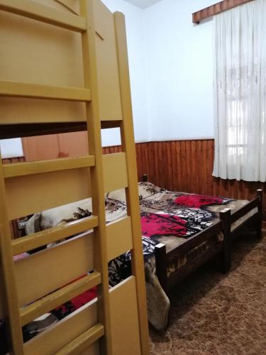 Ένα ή περισσότερα κρεβάτια σε δωμάτιο στο Tiger House Guest House