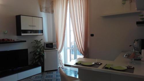 Kuchyň nebo kuchyňský kout v ubytování B&B del Corso