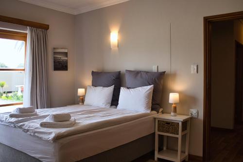 Katil atau katil-katil dalam bilik di Kramersdorf Guesthouse