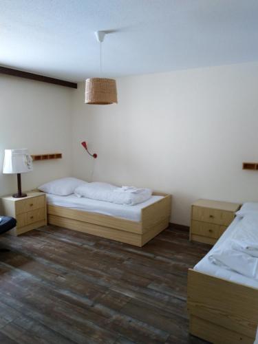 Säng eller sängar i ett rum på Lärchenwald 1805