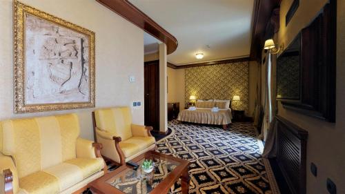 Un ou plusieurs lits dans un hébergement de l'établissement Historic Boutique Hotel Cattaro
