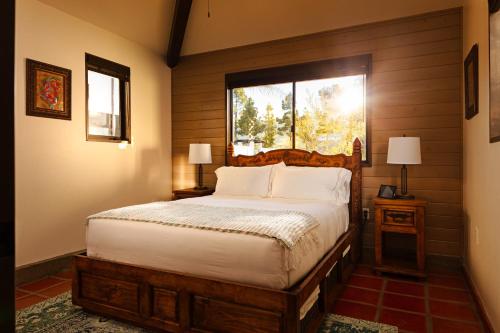 A bed or beds in a room at La Lomita Ranch