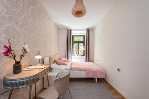 Ένα ή περισσότερα κρεβάτια σε δωμάτιο στο Royal Vega Apartment