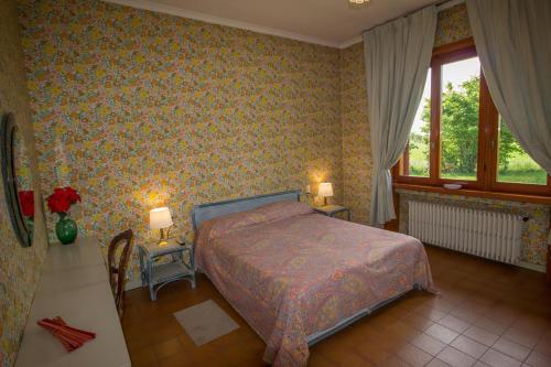 Cama o camas de una habitación en Agriturismo i Quercioli