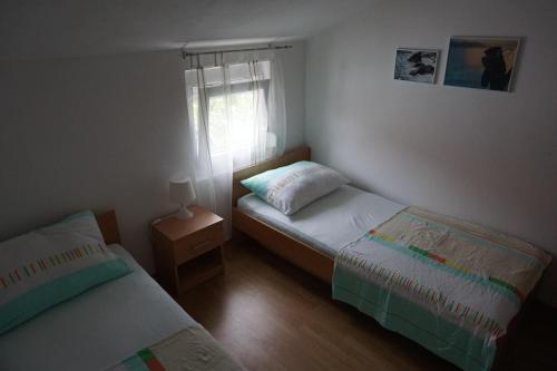 Posteľ alebo postele v izbe v ubytovaní Apartment IJ 3stars 4-6 persons