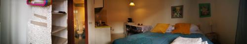 Posteľ alebo postele v izbe v ubytovaní Villa Galilei Rooms