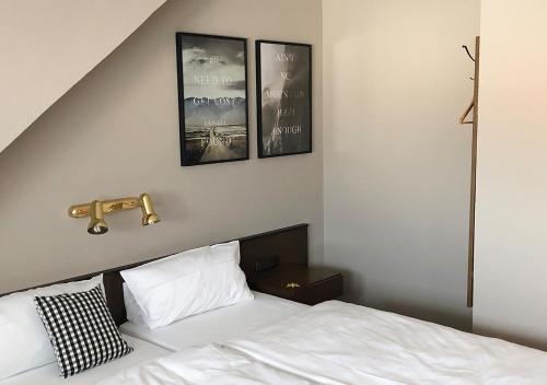 Postel nebo postele na pokoji v ubytování Mangolds Boutique Hotel & Fruehstuecksmeisterei