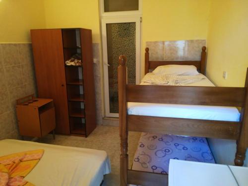 Postel nebo postele na pokoji v ubytování Guesthouse Ada