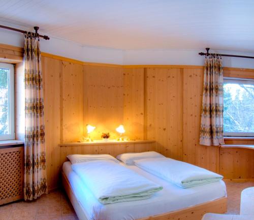 Кровать или кровати в номере Sporthotel Spoegler