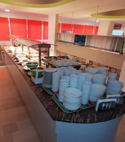 Kuchyň nebo kuchyňský kout v ubytování Helena Hotel