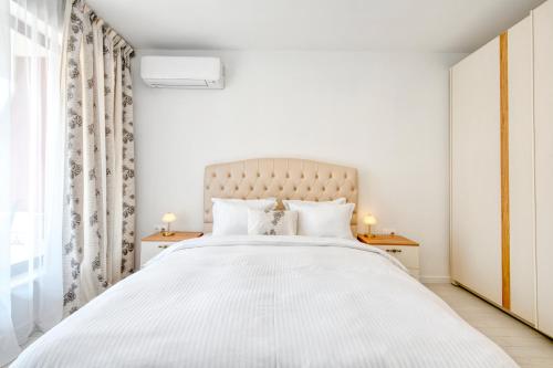 Кровать или кровати в номере Apartment Grand Karavel Centre