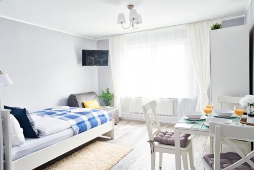 Posteľ alebo postele v izbe v ubytovaní Morning Star Apartments