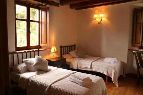 Voodi või voodid majutusasutuse Casa Rural Norita - Adults only toas