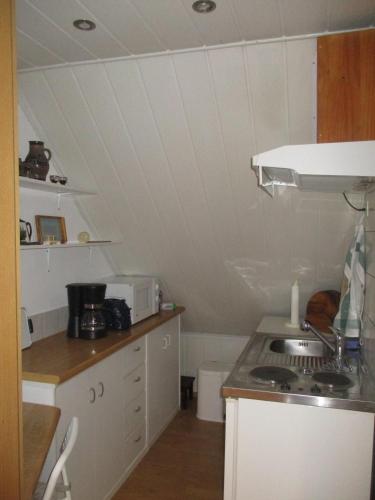 Una cocina o cocineta en Mönchswalder Blick