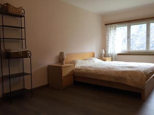 Ένα ή περισσότερα κρεβάτια σε δωμάτιο στο Casa immersa nel vigneto
