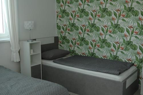 Postel nebo postele na pokoji v ubytování Apartman Tímea