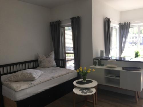 Postel nebo postele na pokoji v ubytování Fewo Watzmann