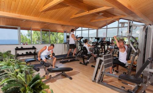 a group of people exercising in a gym at Sunny Hill Alya Hotel in Alanya