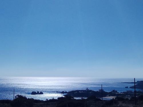 a view of the ocean from a hill at Aelia Luxury Villa in Amoopi