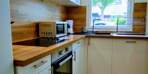 Dapur atau dapur kecil di Appart'HomeCity - Rouen Grand Voile