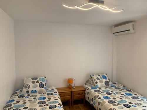 Postel nebo postele na pokoji v ubytování Alicante Elegance Suite