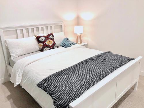 Llit o llits en una habitació de BPM Brighton APT with Garden LG2