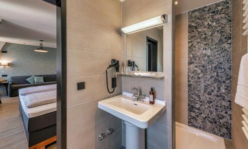 Ванная комната в Hotel Starnberger See