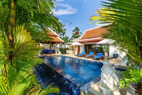 een afbeelding van een zwembad in een villa bij Baan Bua Estate Villas by TropicLook in Nai Harn Beach