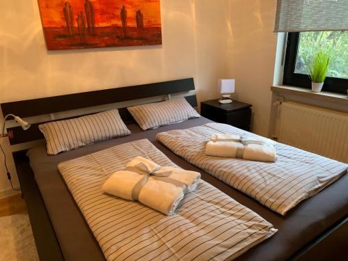 Ένα ή περισσότερα κρεβάτια σε δωμάτιο στο Ferienwohnung Land-Idylle