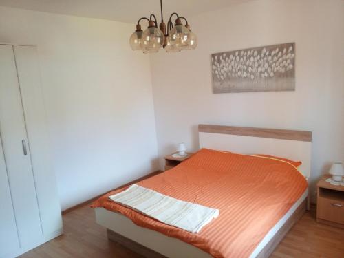 Ένα ή περισσότερα κρεβάτια σε δωμάτιο στο Apartment Rivarela 31