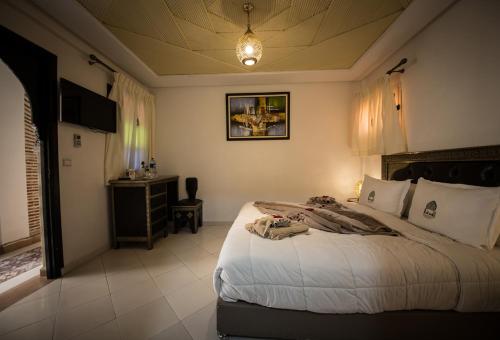 Katil atau katil-katil dalam bilik di Riad Challa Hotel & Spa