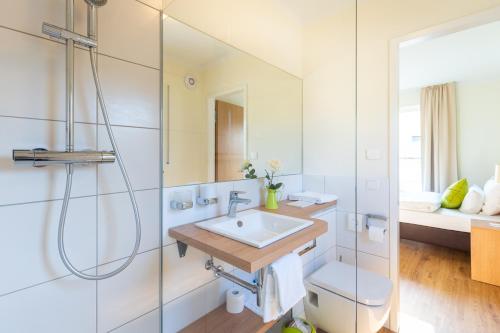 Ванна кімната в INhouse - Wohnen auf Zeit