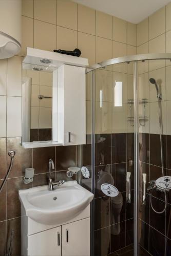 Ванная комната в Apartments Natali