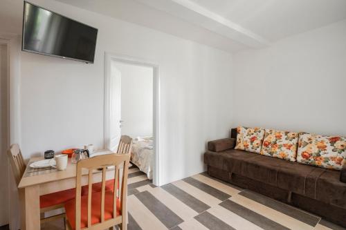 Гостиная зона в Apartments Natali